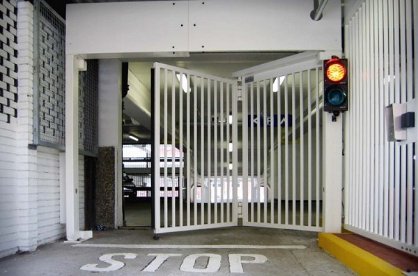 A Typical Electric Fence And Gate In A Upscale Residential Area.