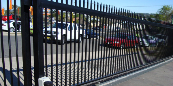 An Image of Steel Automatic Open Gate Sliding For Common Car Parking Area - Commercial Purpose.